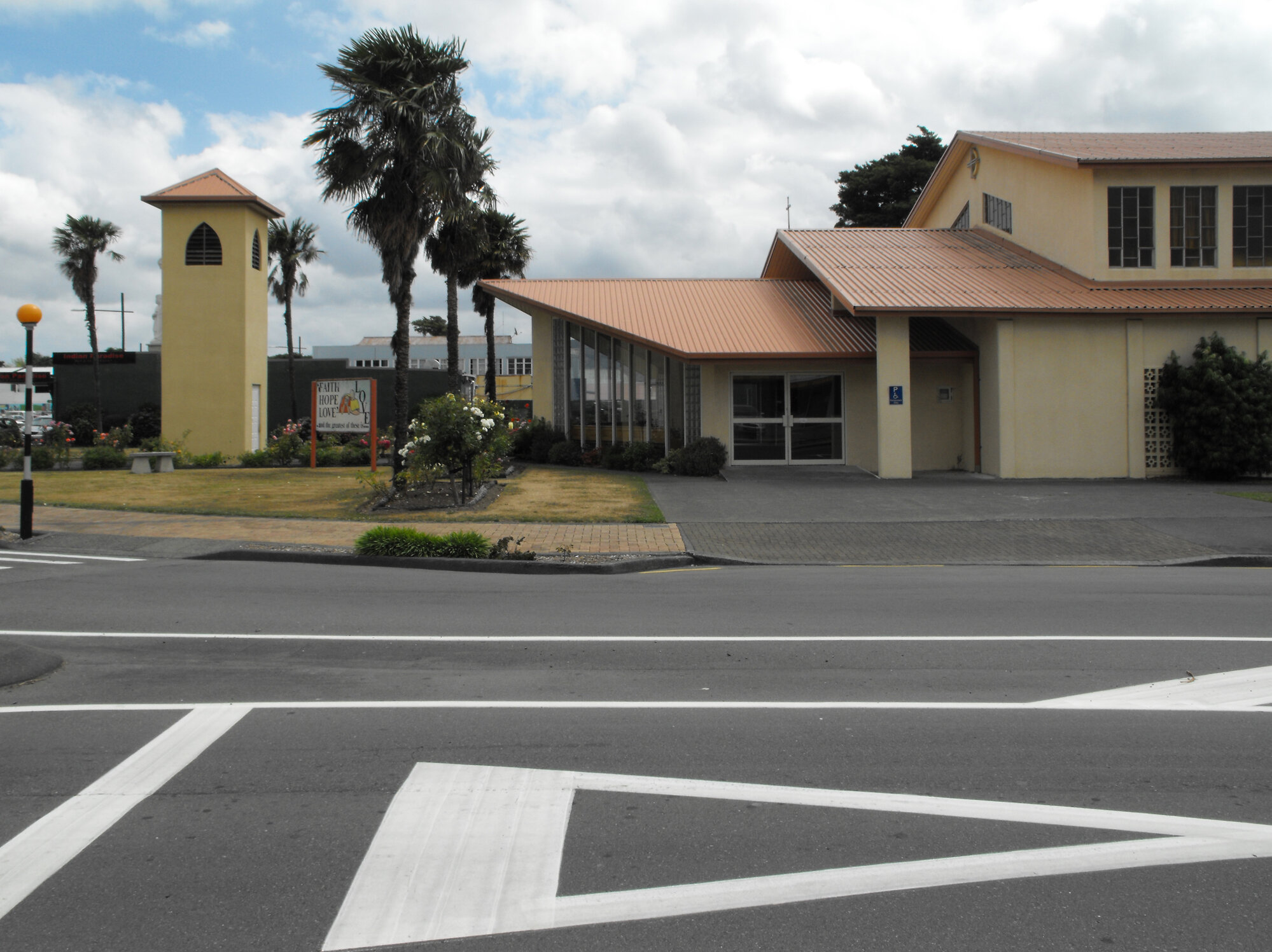 Pine Avenue west side 2; St Joseph's Catholic Church belltower and entry end.