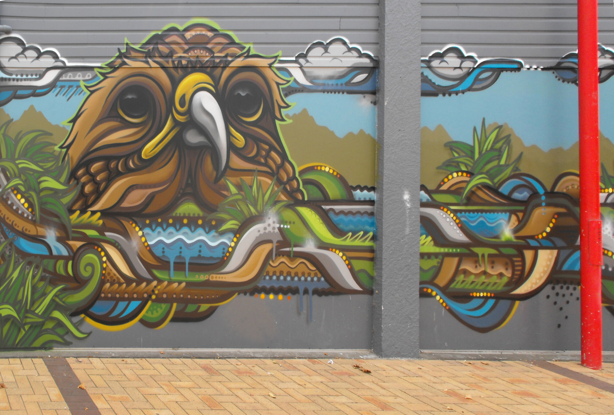 Main Street, north side; No. 137; mural in centre walk 2.