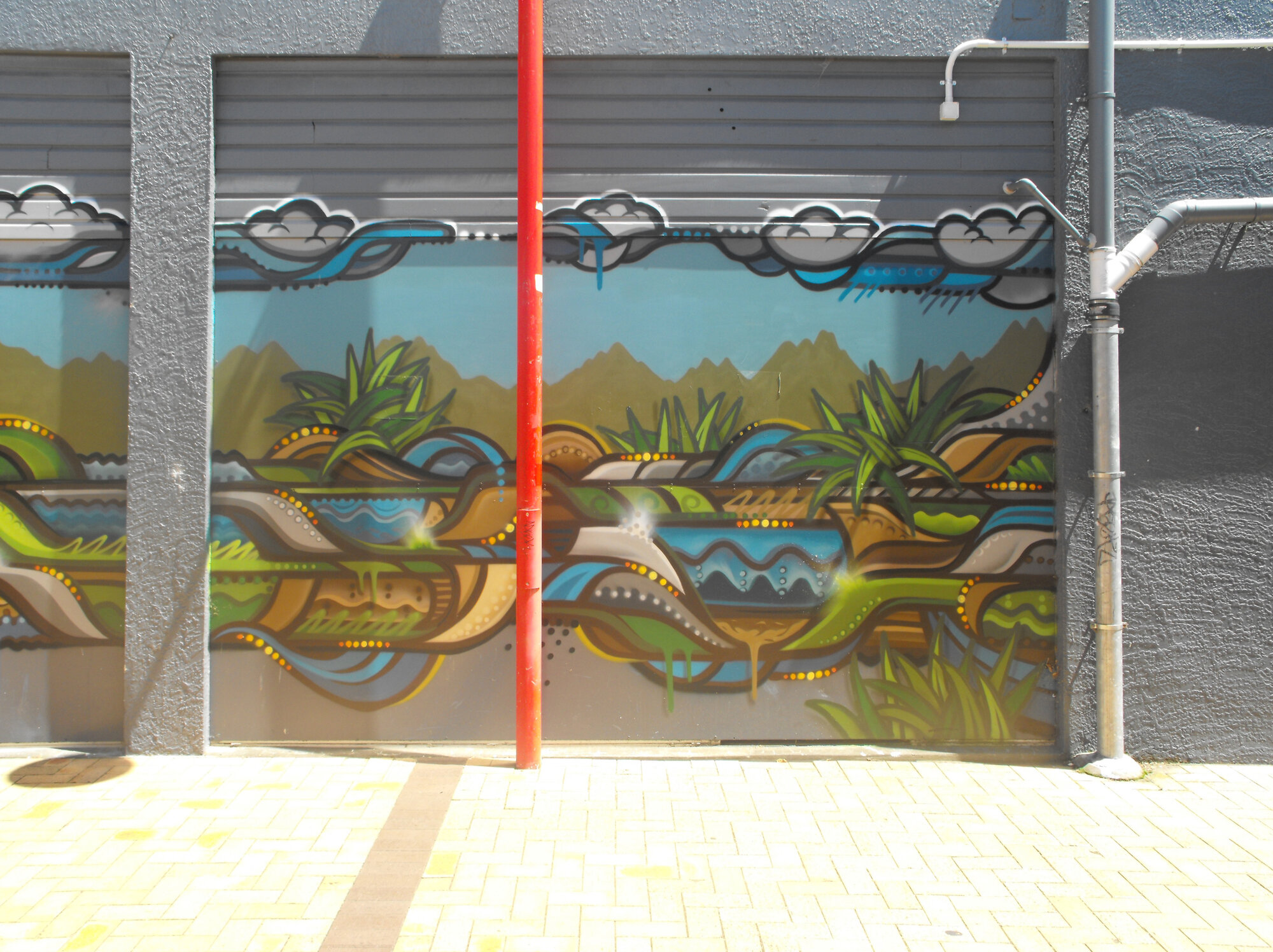 Main Street, north side; No. 137; mural in centre walk 3.
