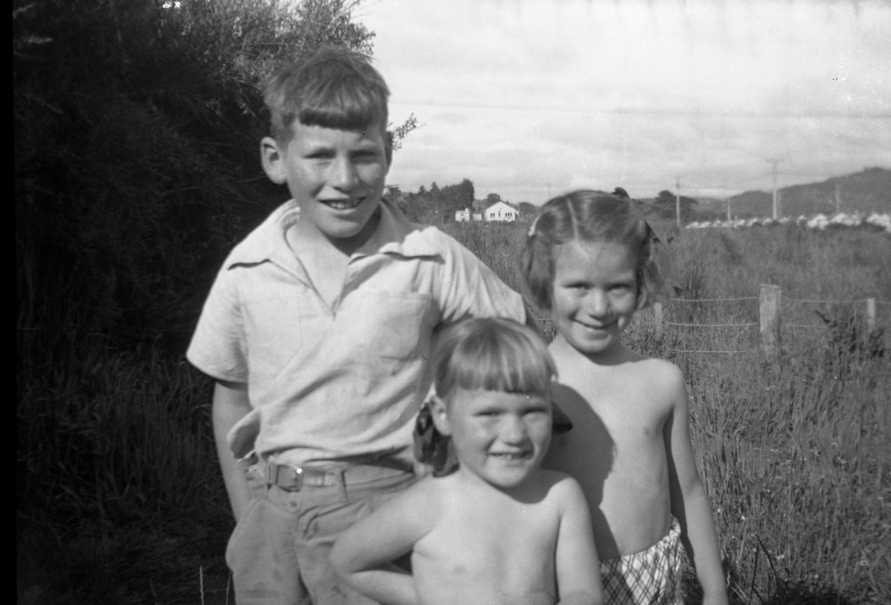 John, Catharine and Susan Haxton, (Maymorn Camp in distance), c1952-53