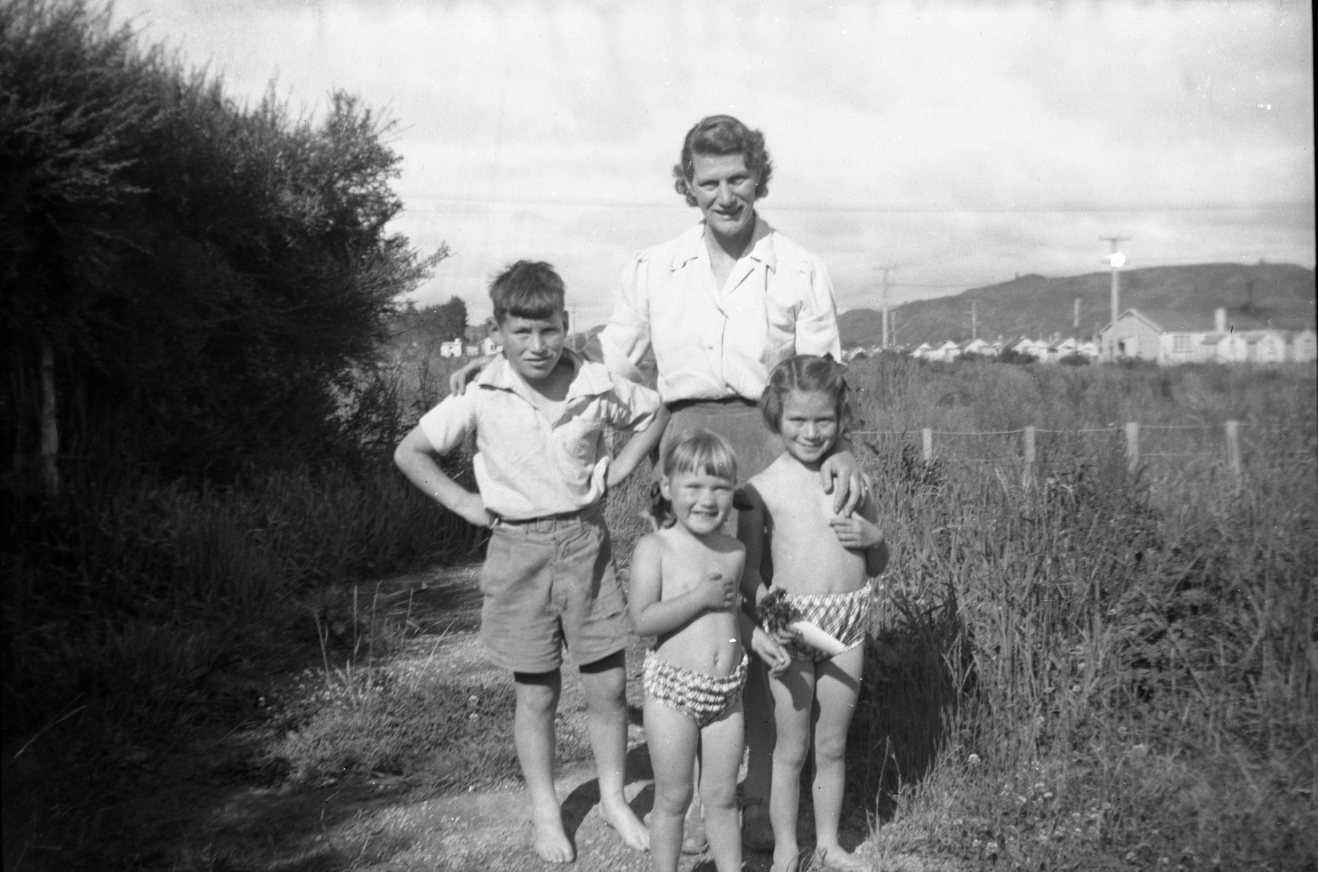 Lillian Haxton and children (Maymorn Camp in distance), c1952-53