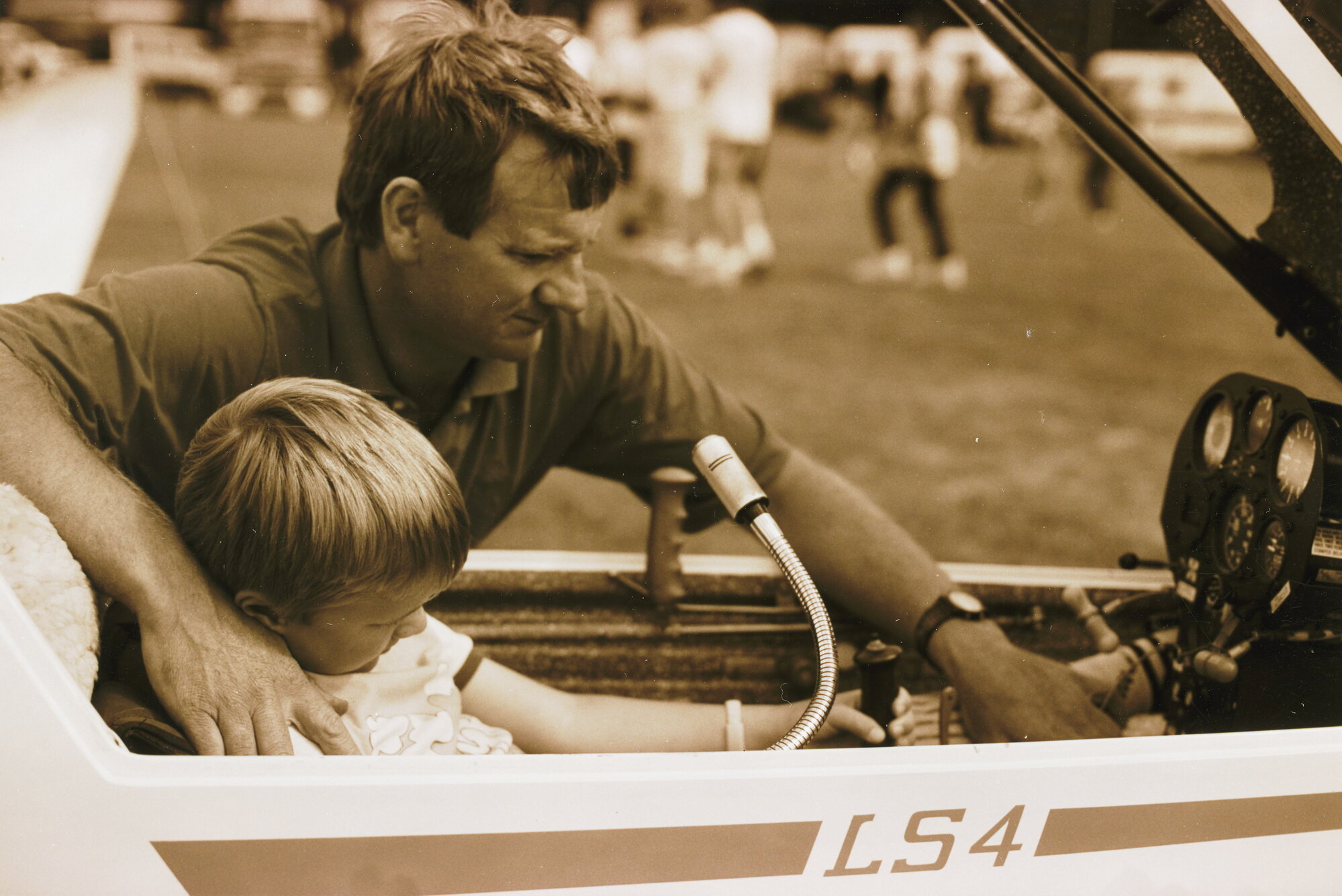 Gliding Club; Tony van Dyk showing son Jason, 5, controls of an LS4 glider.