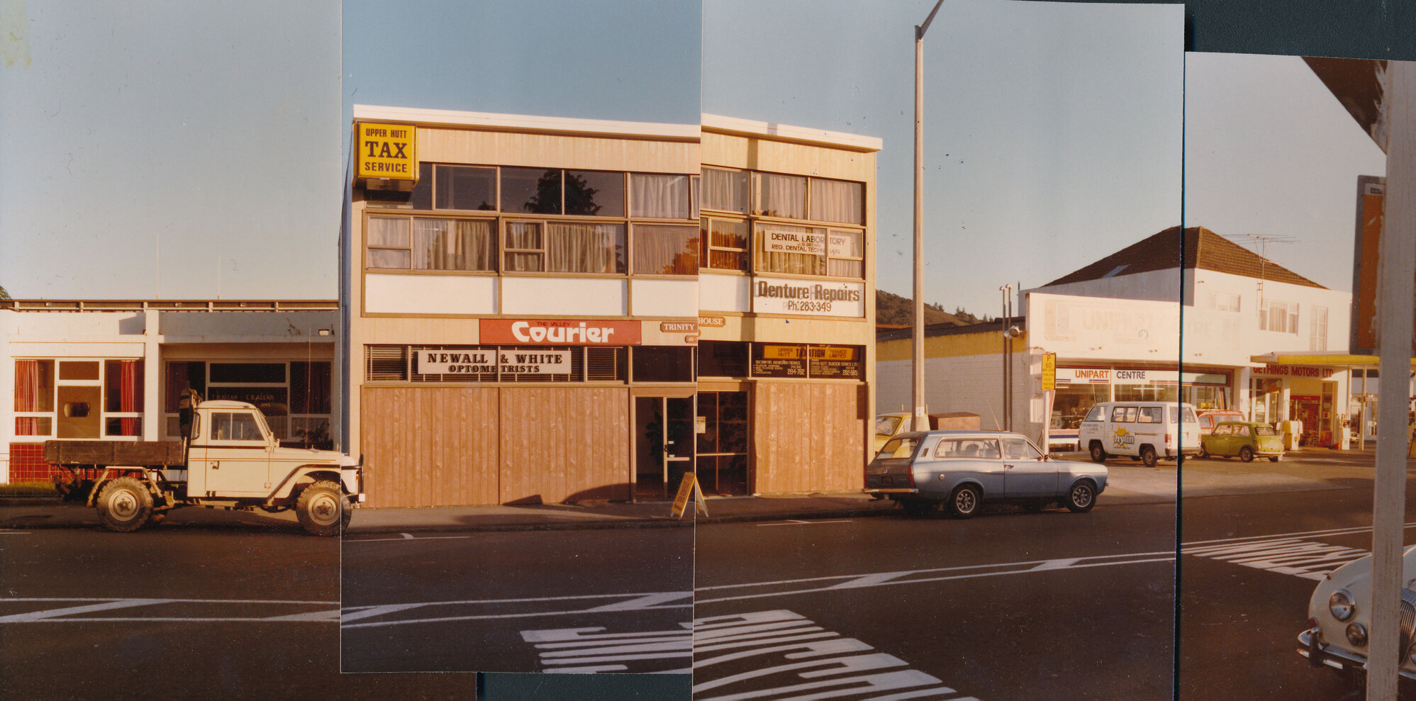 Main Street, south side; dentists, Trinity House, Gethings Motors