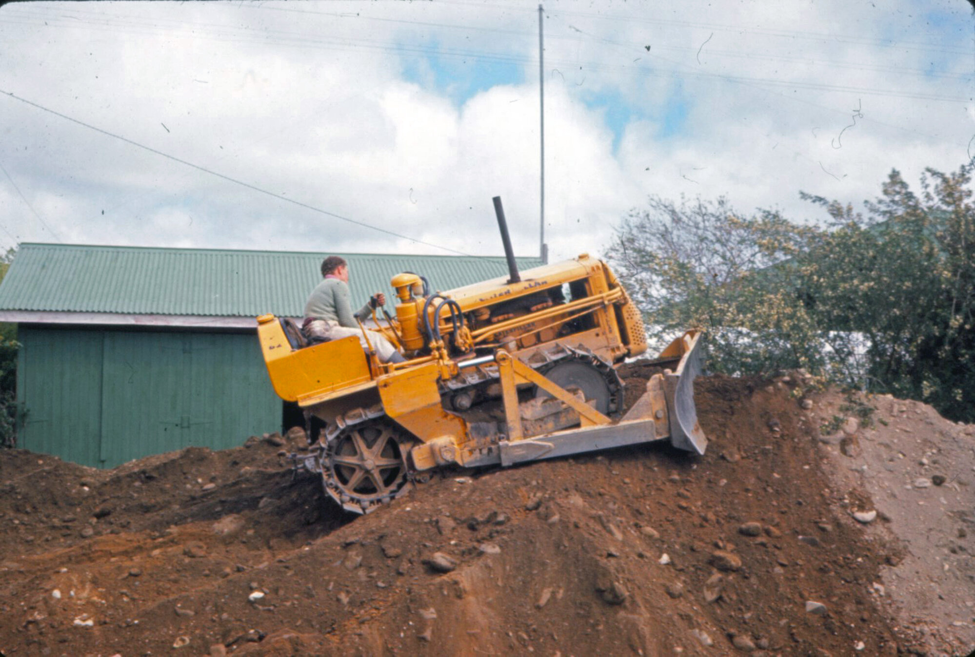 Montgomery Road, later extended westward, forming a crescent; bulldozer