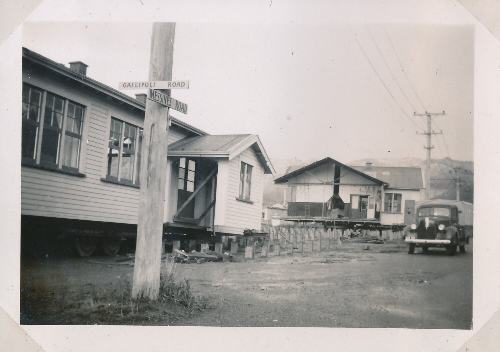 Y.M.C.A Photograph Album Page 10; Reconstructing the Buildings
