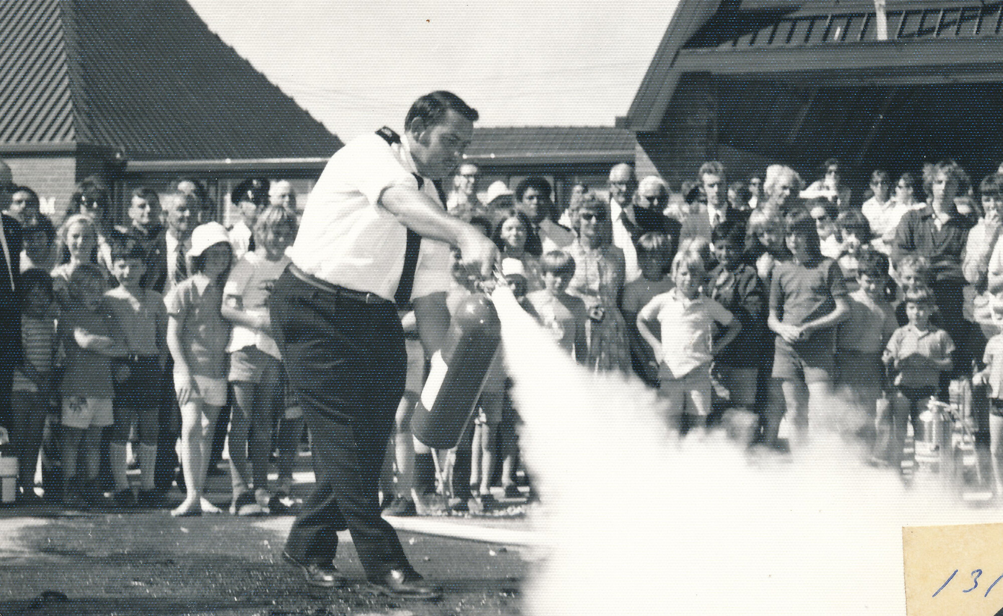 Silverstream Volunteer Fire Brigade; new station opening; November 1974; Mike Day demonstrating a fire extinguisher