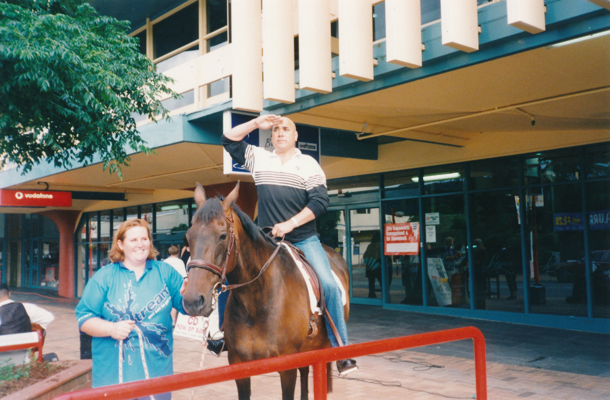 Frankie Stevens on a horse, Main Street; ca 1990s