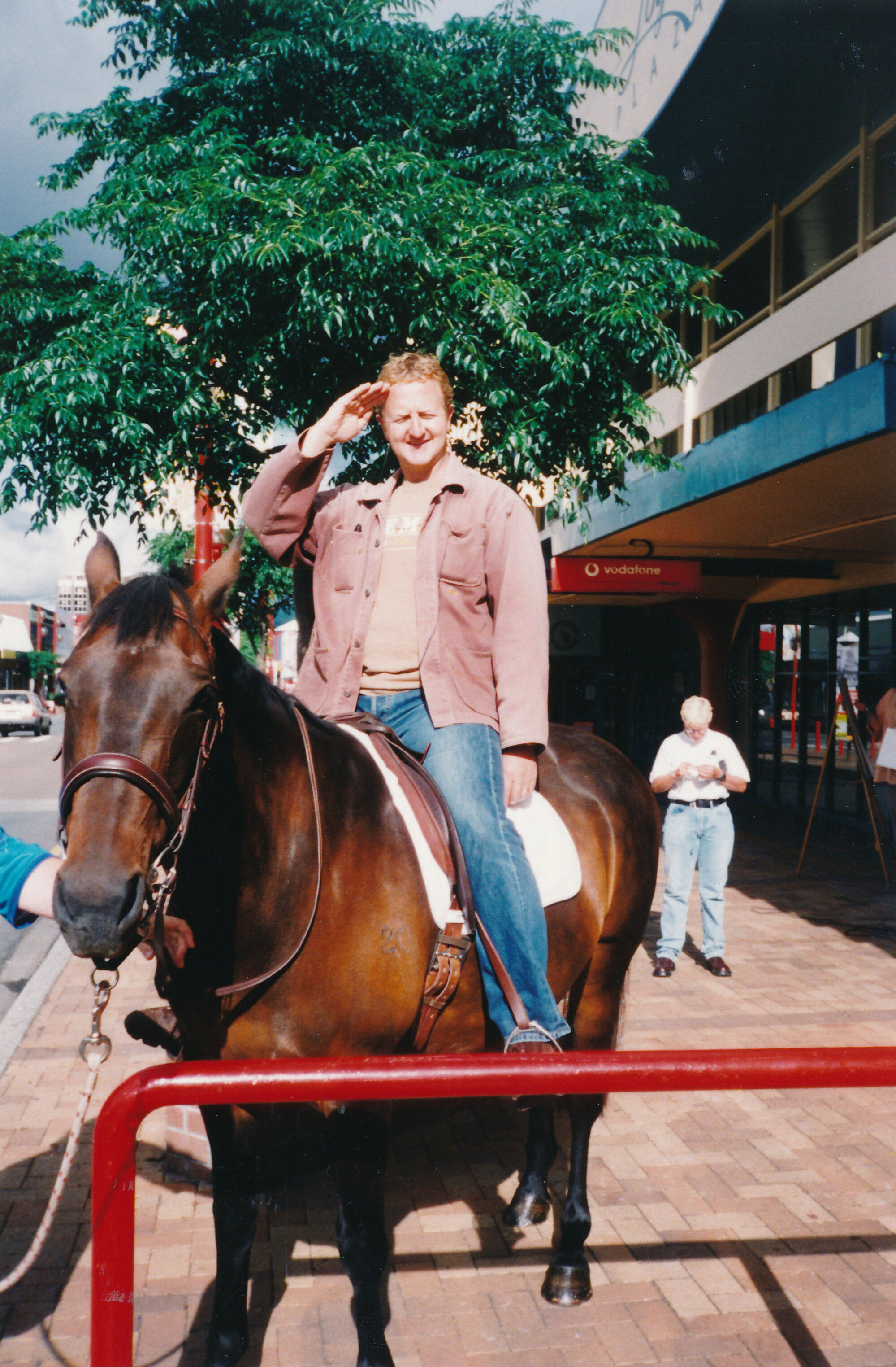 Nick Tansley on a horse; Main Street; ca 1990s