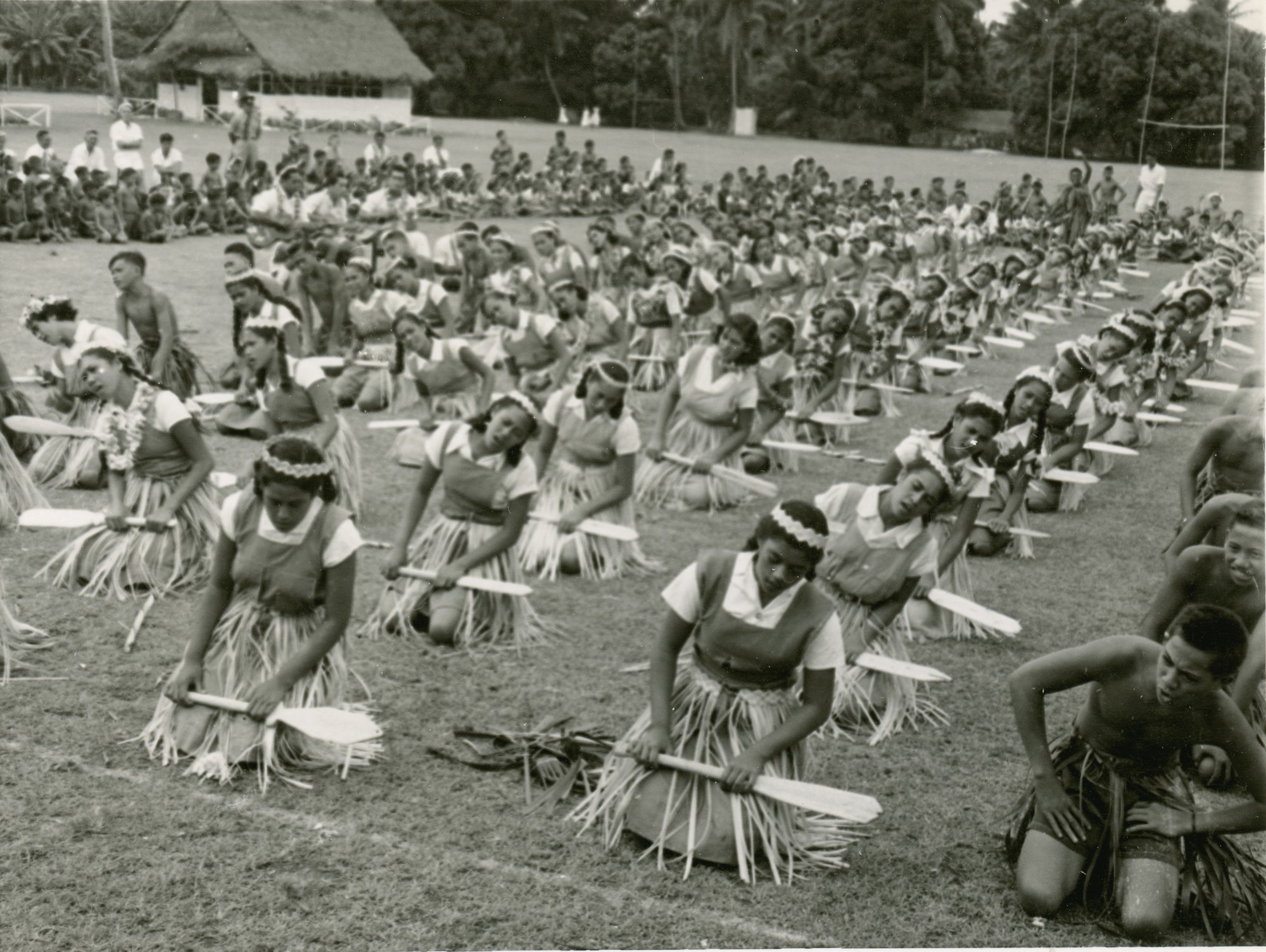 Polynesian school children (probably Niuean) performing an action song. [P1-402-1964]