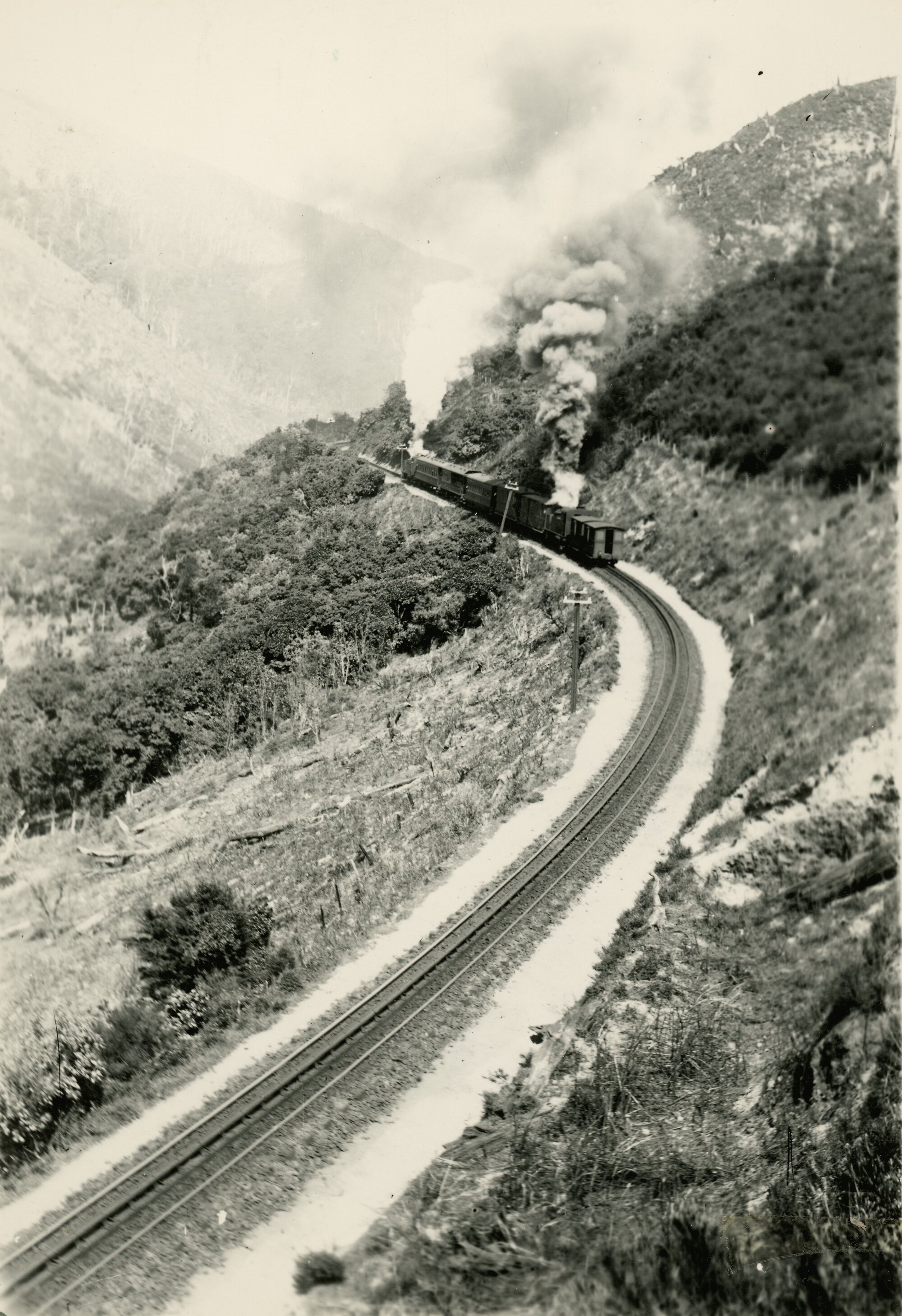 Rimutaka Incline; rear view of passenger train with two Fell locomotives. [P2-15-23]