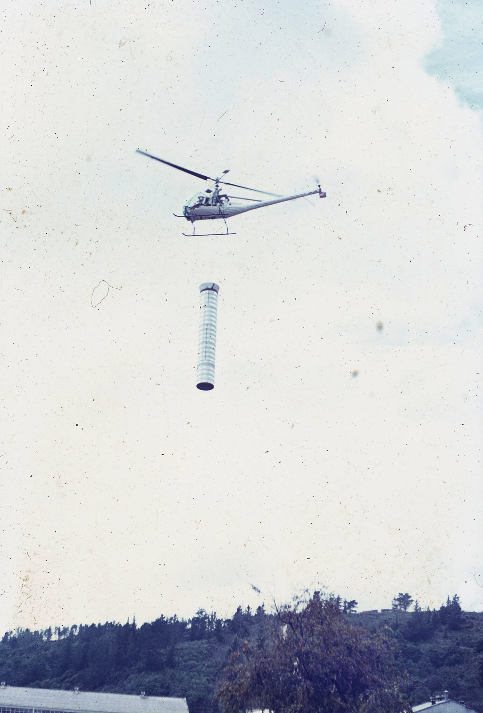 Chimney being helicoptered into Dunlops 