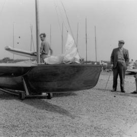 Nobel physicists and outrigger sailing vessel. [P1-404-1966]