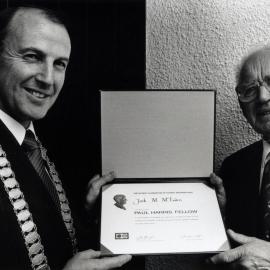 Rotary; president Phil Kidd presents Paul Harris Fellowship award to Ōrongomai Marae kaumātua Jock McEwen.