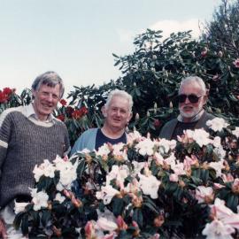 Efil Doog Garden of Art owner Ernest Cosgrove showing off rhododendrons.