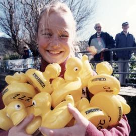 Heretaunga Park; annual duck race; Jennifer Frederickson with an armful.