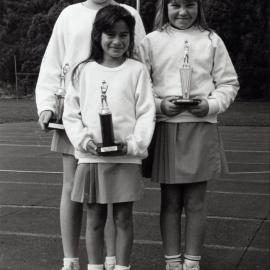 Netball; junior netball club competition; Plateau Primary School trophies.