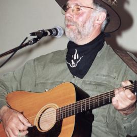 Country Music Club; annual charity concert; singer and guitar picker John Grenell.