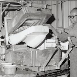 Acma Industries, 71 Montgomery Crescent; Rady Hendi takes polyurethane car seat out of mould.