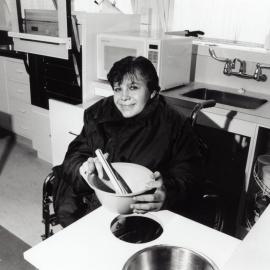 Louise Charles in home economics kitchen for disabled students