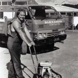 Alexander Contracting; Richard Thomson using a compactor at Woodings Toyota.