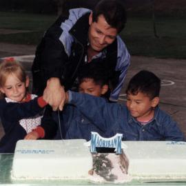Maoribank School's 25th jubilee; youngest pupils Ashley Mason and Robert and Joseph Tamarapa cut the cakes.