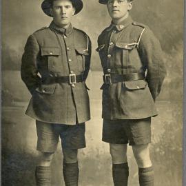Walter Clifford and friend (?) in Army uniform; studio photograph.