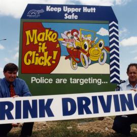 Road safety signs sponsored by McDonald's; Gibbons Street entrance to River Road.