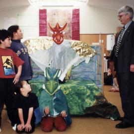 Maoribank School; NZEI National President, Darrell Ward watches a play about taniwha and Wellington Harbour.