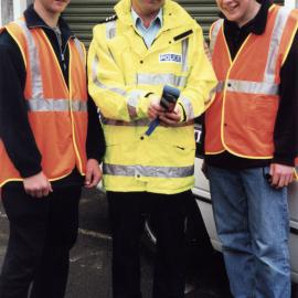 HIBS; Hutt International Boys' School SADD students Gareth Morrison, Matt Jackson with Sergeant John Press.