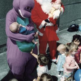 Salvation Army; Barney the Dinosaur and Santa at "Move to the Music" playgroup.