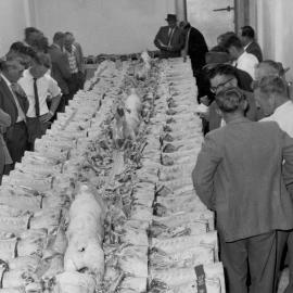 A & P show 1961; jointed carcasses for competition, with competitors and judges.