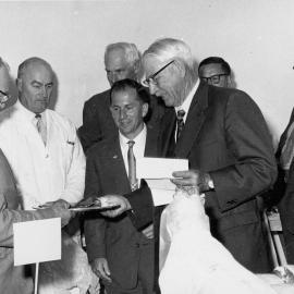 A & P show 1961; jointed meat competition winner being awarded certificate.