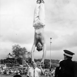 Escapologist at A & P show, Trentham Park 6; lowered from crane.