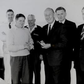 Dunlop group; 25-year presentation to John Corrigan.