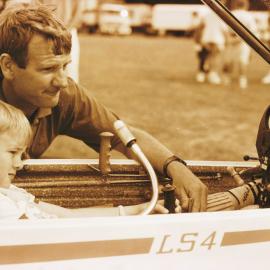 Gliding Club; Tony van Dyk showing son Jason, 5, controls of an LS4 glider.