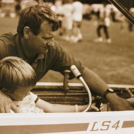 Gliding Club; Tony van Dyk showing son Jason, 5, controls of an LS4 glider.
