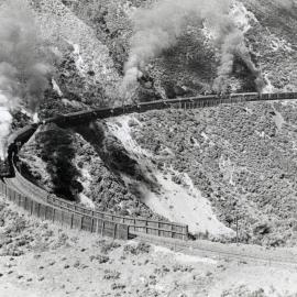 Rimutaka Incline; train rounding 'Siberia' curve (Horseshoe Gully) c1955.  001