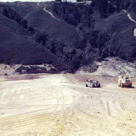 Kingsley Heights 1977 01; hauling down proposed road 01
