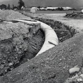 Heretaunga College; stormwater drain curve. River run; backfill in foreground.