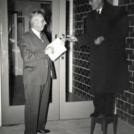 Hapai Club; R H E (Dick) Slacke (Mayor) and T.Craig (Architect) on stool.