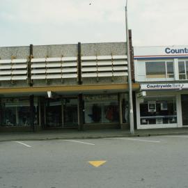 Main Street 1989  8; No. 119-121; Cliff Pepperell's menswear; No. 123, Countrywide Bank.