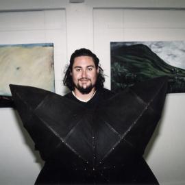 Archibald's Gallery; Will Yates with artworks by himself and two friends.