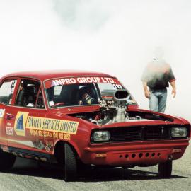 Drag racing; Upper Hutt street drags, Alexandra Road; Rex Duckett in big-block Chevy Vauxhall Viva.