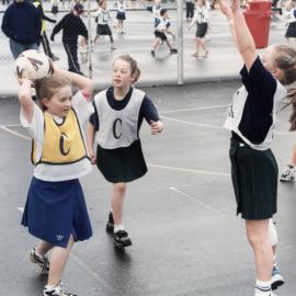 Netball; St Brendan's 'Foxies' in green, 11, Plateau School, gold, 2.