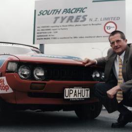 Dunlop Targa rally; Alan Moore's Toyota Celica with promotional plate and mayor Wayne Guppy.
