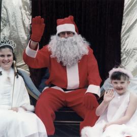Christmas parade 2003; snow princess Anna, Santa, fairy Piper.