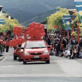Christmas parade 2003; unidentified balloon carriers.