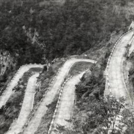 Military Service, World War II; Italy, Dolomites?; switchback road.
