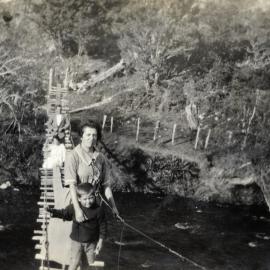 Poulson family; Hec, Esther, Alma, Tom, nearest (on the Poulsons' suspension bridge, Akatarawa?)