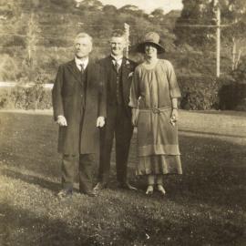 Hazelwood family; wedding 2; groom's father(?) with unidentified bride and groom, at J A Hazelwood's. 